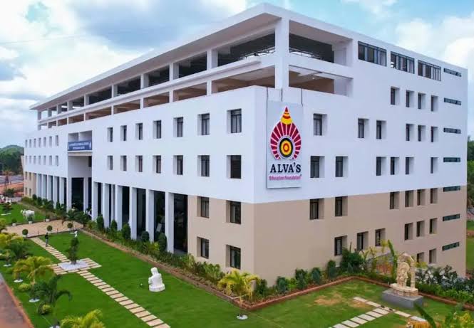 The Alva's Education Foundation building with landscaped lawns in Moodbidri